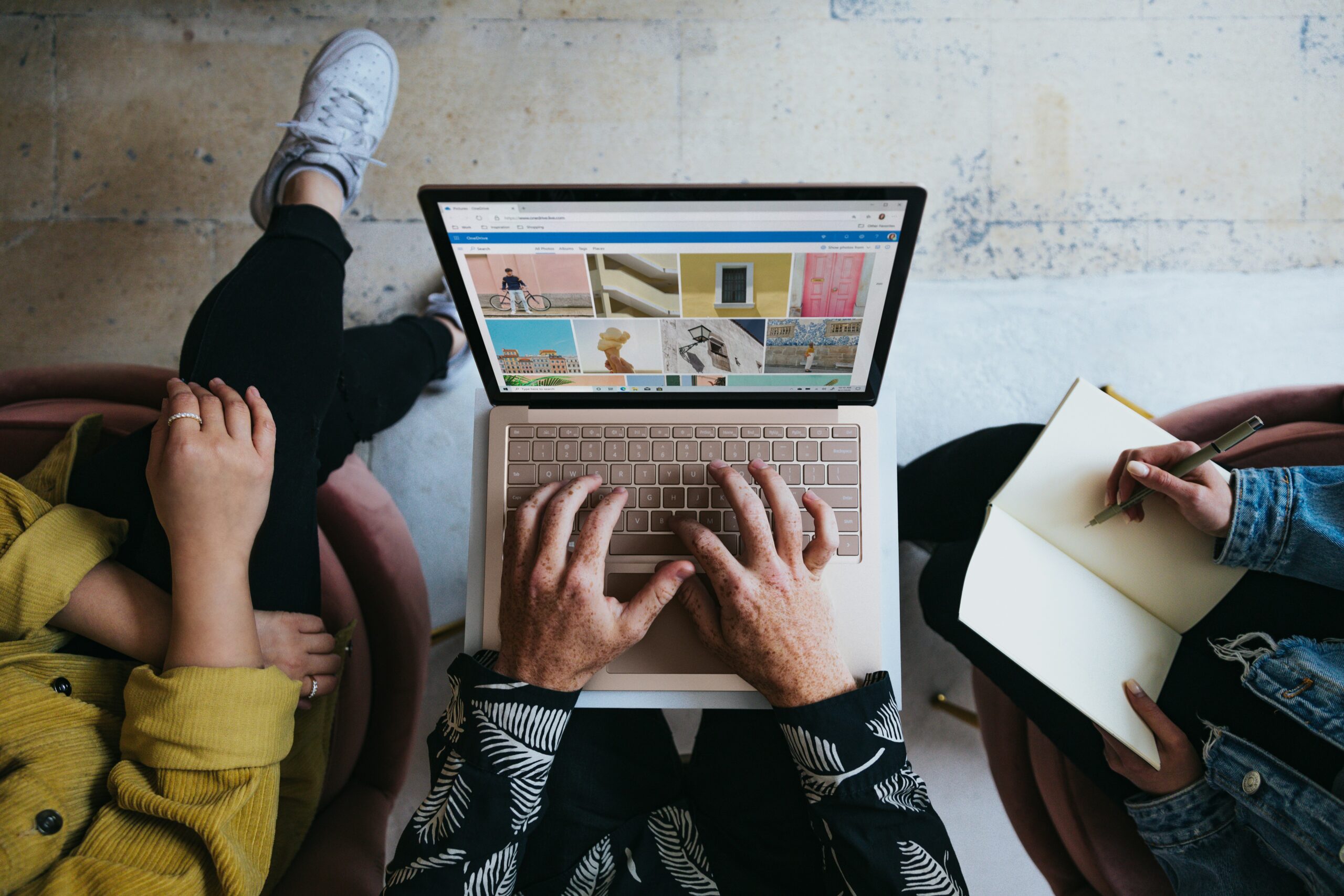 person looking at images on computer